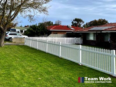 PVC fencing in a new English Flat style, supplied and installed by Team Work Fencing Contractors in Perth.
