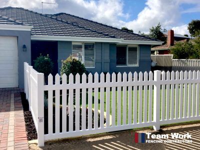 New English Flat PVC picket fencing installation